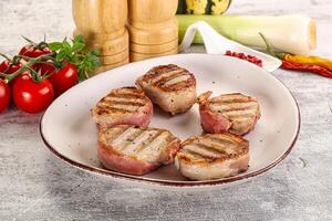 Grilled pork tenderloin with bacon photo