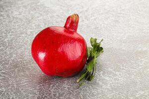 Ripe red sweet and juicy Pomegranate photo