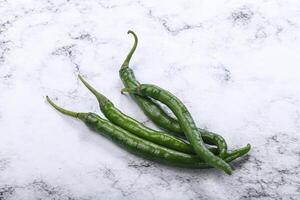 Hot and spicy green chili pepper photo