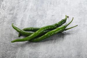 Hot and spicy green chili pepper photo