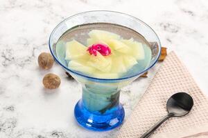 Sweet pineapple jelly with mint photo