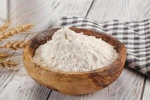 Wheat flour heap for bake photo