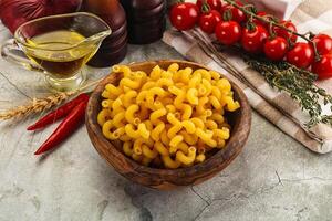 Italian cuisine - dry cellentani pasta photo