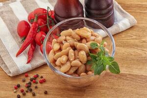 Whinte canned kidney beans in the bowl photo