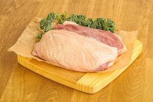 Raw duck breast for cooking photo