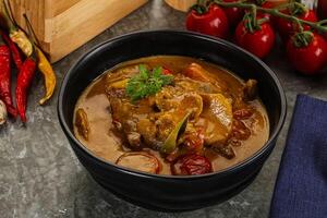 Yellow THai curry with beef photo