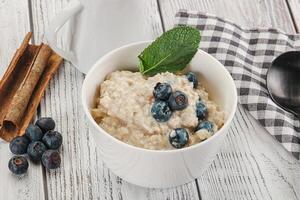 Oats porridge with blueberry photo