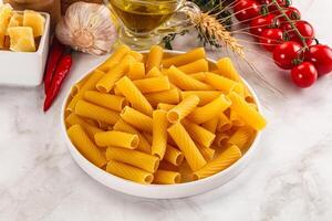 Italian cuisine - dry tortiglioni pasta photo