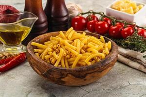 Italian pasta Maccherony for cooking photo