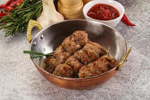 Beef kebab minced meat with onion photo