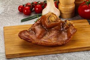 Smoked pork ear snack appetizer photo