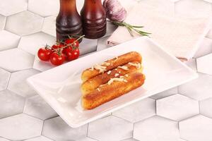 Fried cheese sticks for snack photo