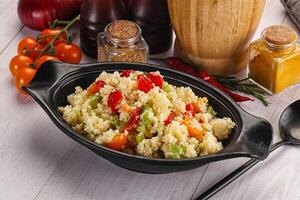 Vegan cuisine couscous with vegetables photo