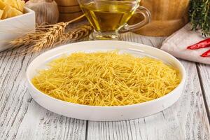 Raw dry Italian pasta Vermicelli photo