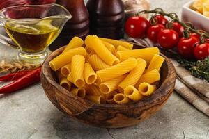 Italian cuisine - dry tortiglioni pasta photo