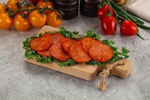 Spanish salami cured chorizo sausage photo