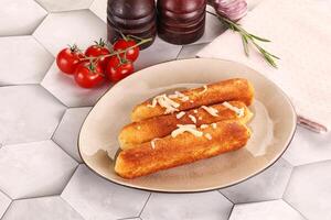 Fried cheese sticks for snack photo