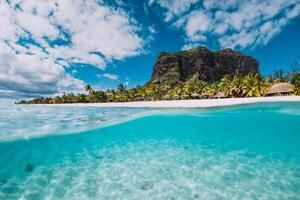 Tropical blue ocean with Le Morne mountain and luxury beach in Mauritius. Split view. photo