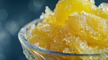 a close up of a bowl of ice cream with a spoon in it photo