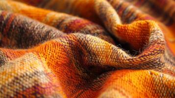 A close up of a vibrant plaid blanket with intricate patterns photo