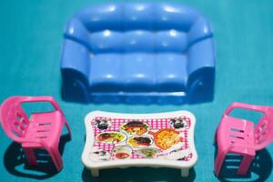 Children's toys on a blue background photo