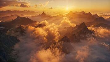 Cloudcovered mountain range at sunset, under a colorful afterglow photo