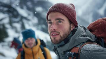 a man with a backpack is standing in the snow photo