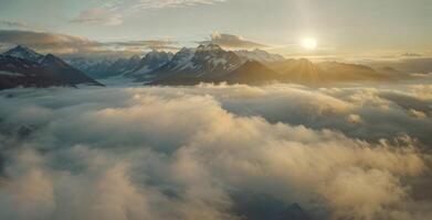 Sunlight breaking through clouds over mountain range, creating calm atmosphere photo