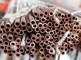 Many copper pipes, warehouse copper plates photo