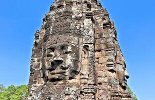 bayon templo en Camboya, caras de desconocido deidades foto