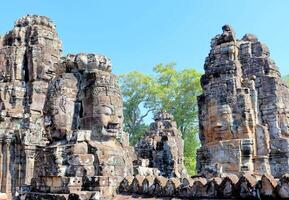 Bayon temple in Cambodia, faces of unknown deities photo