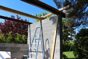 Construction of a wooden roof photo