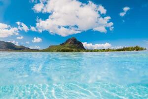 Transparent ocean and view with Le Morne mountain in Mauritius. photo