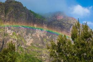 Colorful rainbow and Le Morn brabant mountain in Mauritius island photo