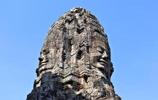 bayon templo en Camboya, caras de desconocido deidades foto