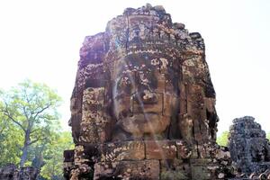 bayon templo en Camboya, caras de desconocido deidades foto