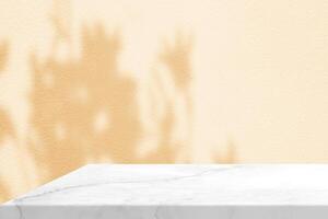 Minimal White Marble Table Corner with Flower Shadow and Beige Light Beam on Concrete Wall Background photo