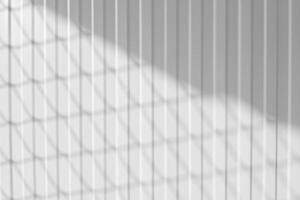 Mesh Fence Shadow on Container Wall Background. photo