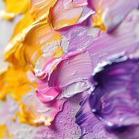 Closeup of a vibrant purple and yellow flower painting on canvas photo