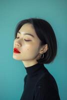 Black turtleneck frames her red lips, accentuating jawline and cheekbones photo