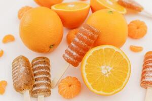 Homemade marmalade jelly with sweet citrus fruits. Flat lay, top view photo