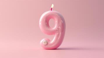 Pink Candle in the Shape of the Number Nine photo