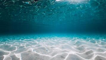 Ocean with sandy bottom in Bahamas. Panoramic underwater background photo