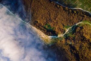 Aerial view with creeping clouds and mountains in Anapa. photo