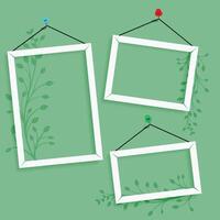 empty photo frame with floral decoration vector