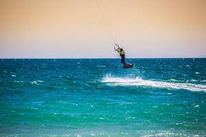 flying kiter in Tarifa photo