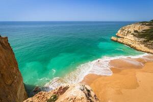 Praia de Benagil beach on atlantic coast, Algarve, Portugal photo