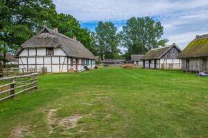 Traditional thatched house Kluki Poland photo