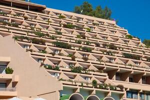 holiday apartment building and sun terrace in Ibiza island, Spain photo