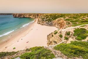 Beautiful bay and sandy beach of Praia do Beliche near Cabo Sao Vicente, Algarve region, Portugal photo